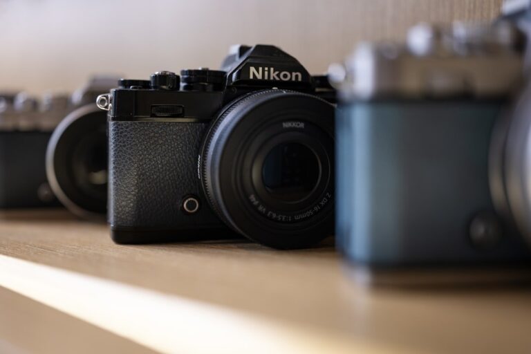 A close-up of a well-used Nikon mirrorless camera, illustrating the concept of shutter counts and camera longevity.