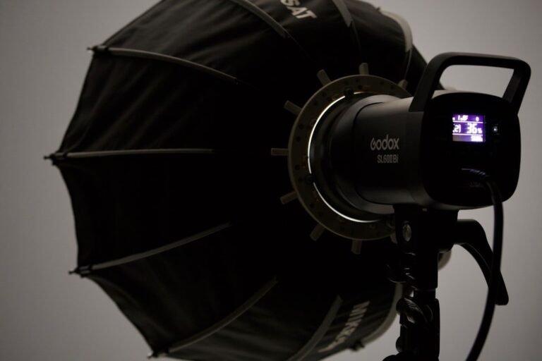 The new Godox iM30Pro ultra-compact mini flash shown on a black background.