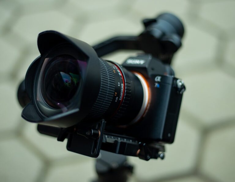 A close-up product shot of the new Samyang Schneider Kreuznach AF 60-180mm f/2.8 FE lens on display.