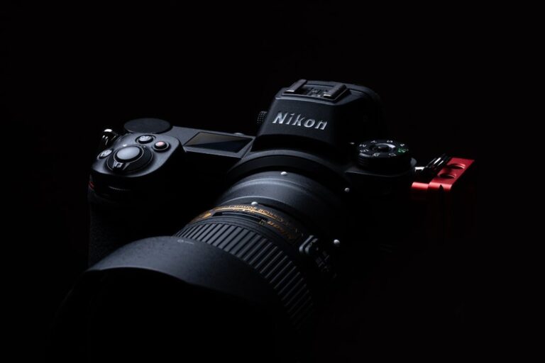 A front-facing shot of the professional Nikon Z9 camera body with a lens attached, highlighting its robust build.