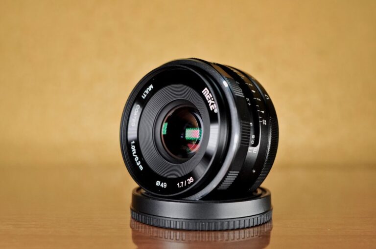 The new Meike AF 85mm f/1.8 lens for Fujifilm GFX, viewed from the side, showing its lens mount and barrel.
